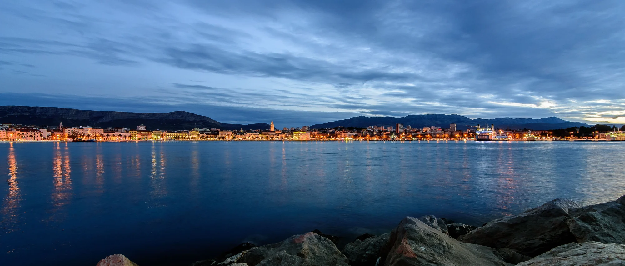 Split waterfront after dark